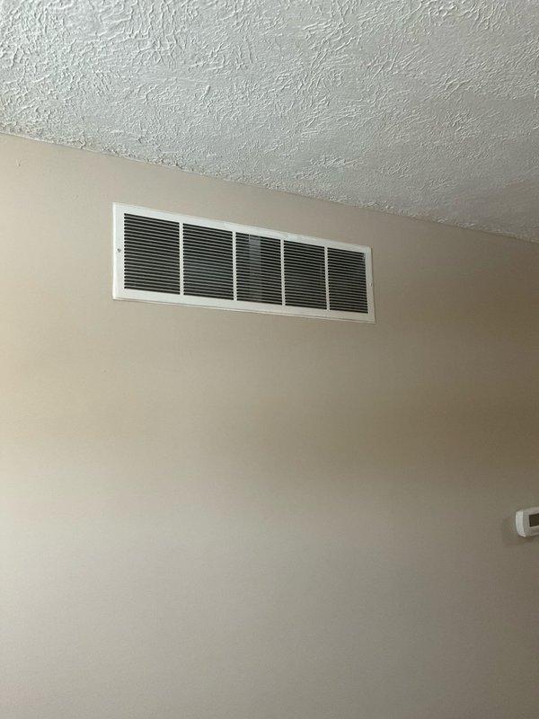 Conducted initial assessment of property featuring dual HVAC system setup with one older electric unit showing significant wear and a newer secondary unit. Client expressed interest in comprehensive system upgrade including humidity control capabilities, dual-zone configuration (upstairs/downstairs), and air purification features. Documented existing return air registers and current thermostat placement for zoning evaluation. Client requesting both cash and financing options for comparison.