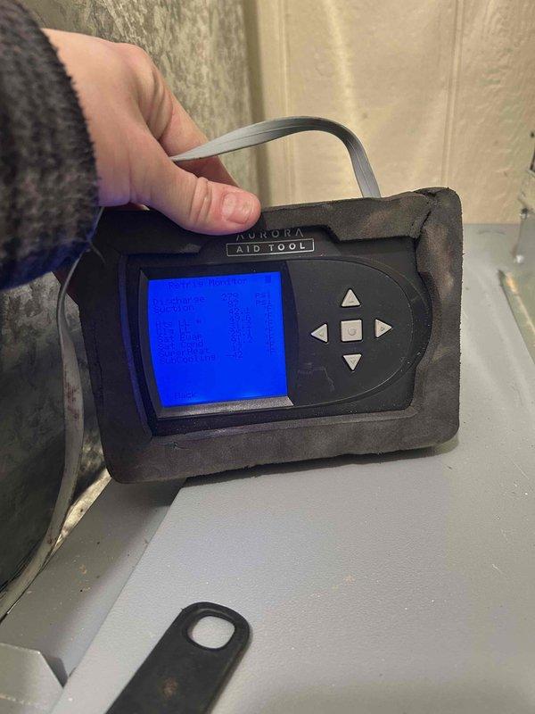 Responded to a service call for a Waterfurnace geothermal system displaying error code E3 "FLAME DETECT FAI" with "SERVICE NEEDED" and "RESET TRIP" warnings on the control panel. Utilized Aurora AID diagnostic tool to troubleshoot the flame detection failure issue. Reset system and verified proper operation before departure.