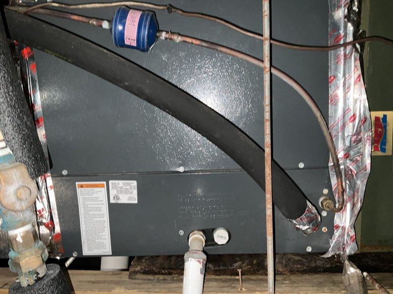 Performed replacement of failed HVAC system due to water damage for clients Dustin and Bailey. Installed new cooling and heating unit in utility area, including proper refrigerant lines with filter drier and insulation. Verified electrical connections at panel to ensure system functionality.