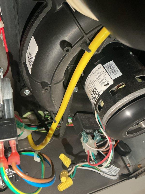 Performed comprehensive heating maintenance on customer's HVAC system. Inspected blower motor assembly, verified all electrical connections were secure with proper wire nuts, and examined filter housing components. System functionality confirmed with all components operating within normal parameters.