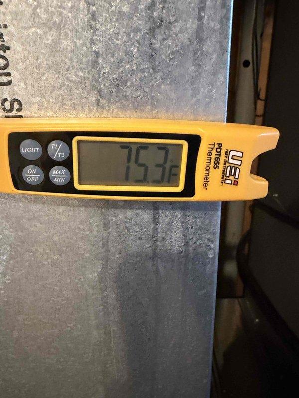 Completed installation of new Lennox HVAC system, including outdoor condenser unit properly mounted on concrete pad with all necessary refrigerant lines and electrical connections. System was fully tested with temperature verification showing proper operation at 75.7°F. Customer financing documentation was completed and identification verified.