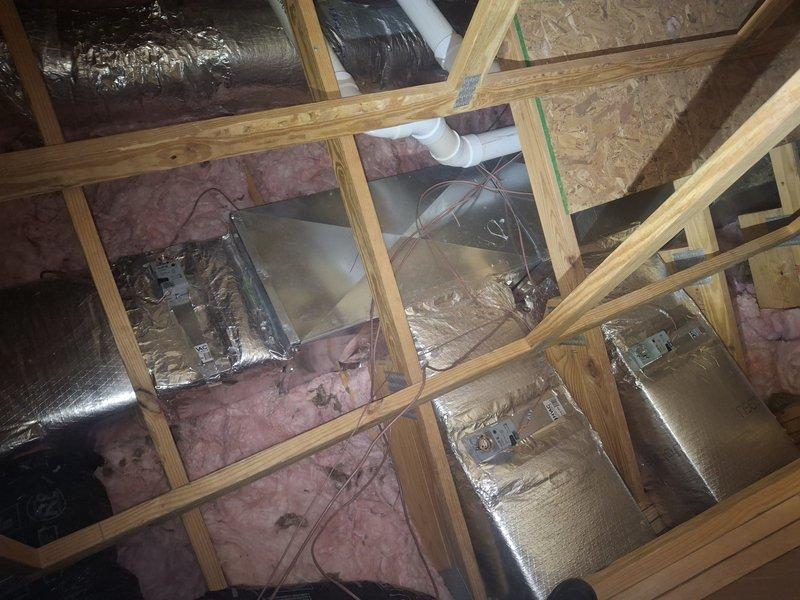 Conducted inspection of attic space to identify and correct zone control issue in Classroom 3. Located ductwork with incorrect zone assignments and traced damper connections to resolve communication problem between thermostat and corresponding zone dampers. System now functioning with proper zone control.