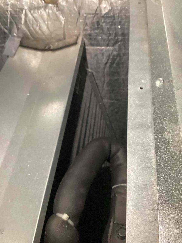 Performed monthly basic maintenance on CCHP heating system, checking operation and verifying proper function. Inspected thermostat which displayed normal operation at 69°F in heating mode. Examined ductwork and insulation, confirming all components secure and in good working condition.