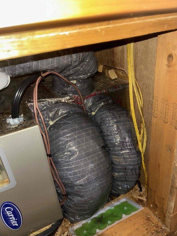 Performed initial assessment of HVAC system with particular focus on ductwork in confined space. Identified potential leak issue in the Carrier unit where flexible ducts connect to the main system. Comprehensive leak search scheduled for follow-up visit to properly diagnose and address the problem.