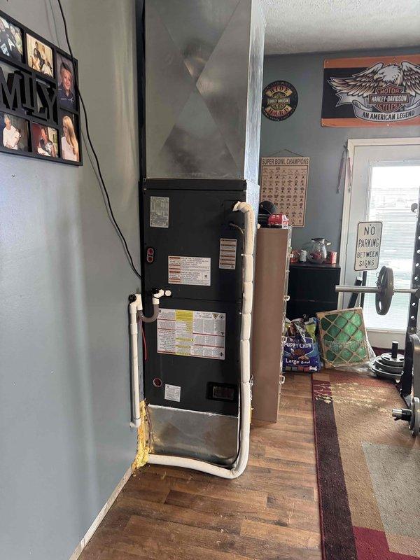 Installed new air handler to ensure system compatibility with existing infrastructure. Confirmed proper airflow with readings of 85.4 CFM through the supply vents after installation. Unit was properly mounted with PVC drain lines connected according to manufacturer specifications.
