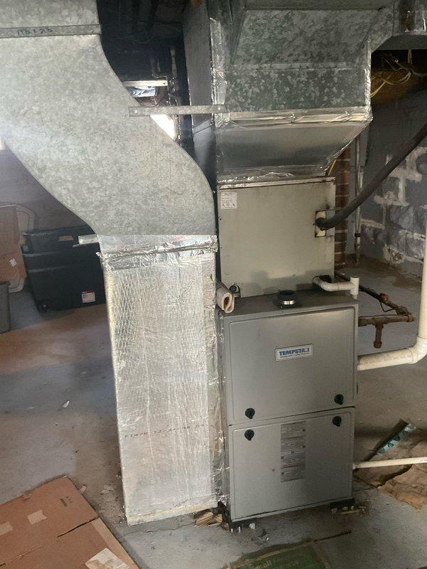 Performed comprehensive evaluation of existing HVAC system after customer reported inconsistent temperatures and furnace blowing cool air. Assessed and documented current Tempstar furnace installation including ductwork configuration, condensate drainage, and ventilation components. Prepared full system replacement estimate as requested by customer, who indicated urgency for upgrade with immediate timeline.