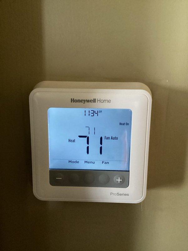 Performed warranty service on heat pump system experiencing improper cycling operation. Customer reported unit shutting off prematurely and suspected refrigerant loss. Inspected system components including furnace/air handler, ductwork, and Honeywell ProSeries thermostat, which was functioning properly in heat mode. Verified proper installation of condensate lines and ventilation.