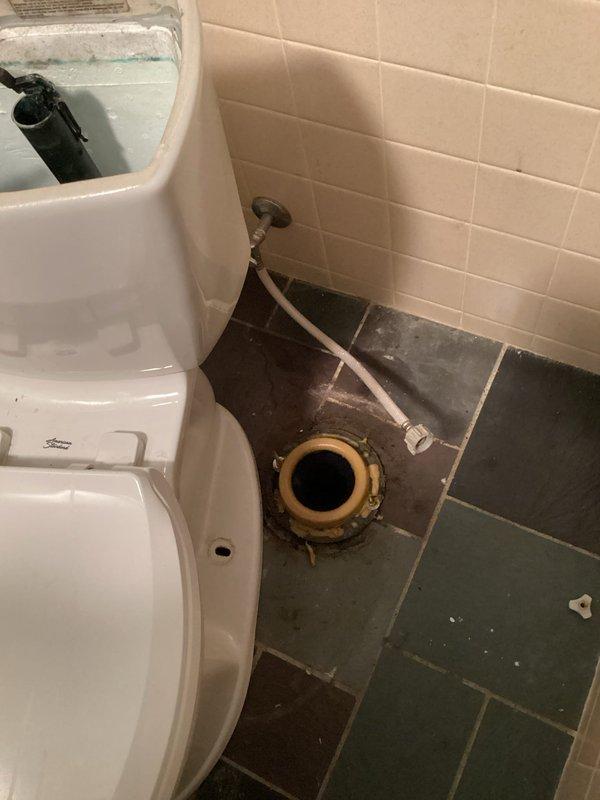 Responded to a water leak complaint where water was coming through the ceiling from an upstairs bathroom. Upon inspection, identified a faulty fill valve and worn flapper assembly in the toilet tank causing continuous water seepage. Replaced the toilet flange, installed new fill valve and flapper mechanism, and verified proper water shut-off function to resolve the leak issue.