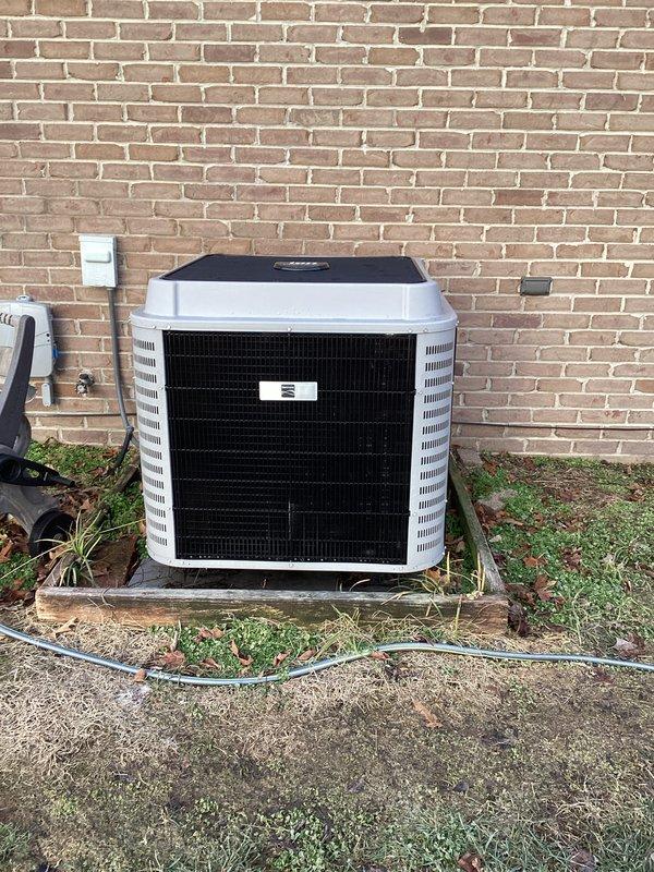 Performed monthly maintenance on heating system including inspection of blower wheel assembly which showed normal dust accumulation but remains in functional condition. Cleaned and reinstalled washable filter as per maintenance protocol. Inspected exterior condenser unit which is properly mounted on platform with electrical connections intact.