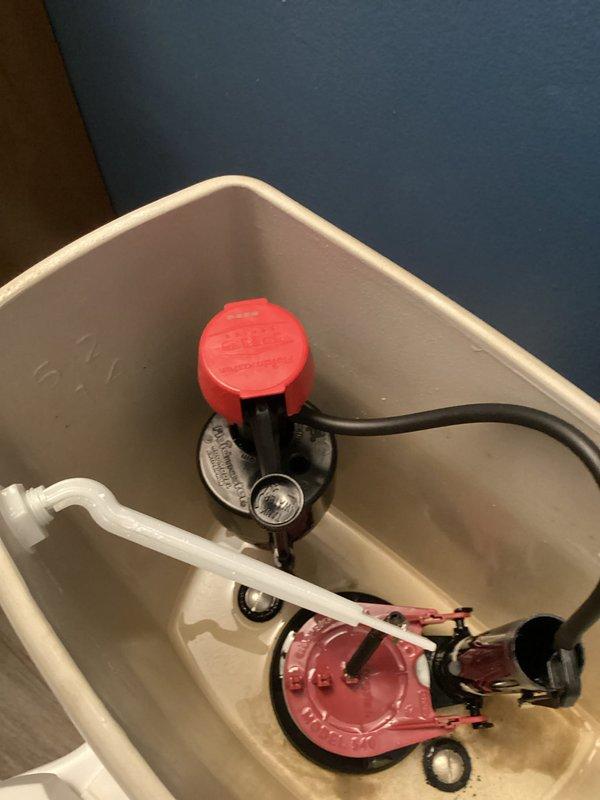 Responded to a service call regarding unusually high water usage (51,000 gallons previous month, 27,000 gallons current month). Upon inspection, detected a faulty toilet flapper valve causing continuous water leakage. Examined internal tank components, noted mineral buildup, and identified this as the source of the significant water consumption spike reported by customer.