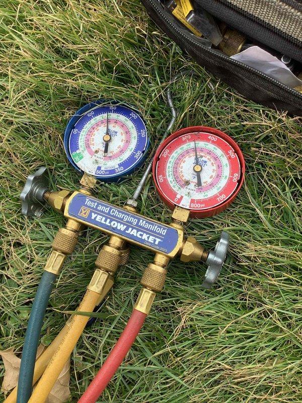 Responded to no-heat call for furnace that would not activate. Inspected thermostat (Honeywell ProSeries) which displayed 60°F current temperature with 71°F setpoint in Permanent Hold mode. Connected test and charging manifold to diagnose system operation. Identified and resolved issue, restoring proper heating function.