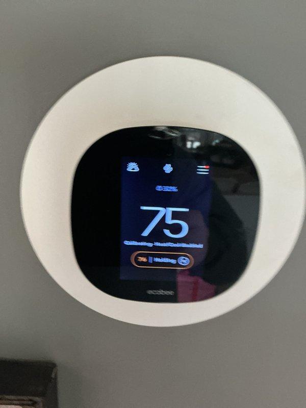 Performed monthly basic heating maintenance on customer's CCHP system. Inspected blower wheel assembly for proper operation and cleanliness, noting minor dust accumulation but overall good condition. Verified thermostat functionality with system maintaining setpoint of 75°F. Filter replacement not included in service (20x25x4).