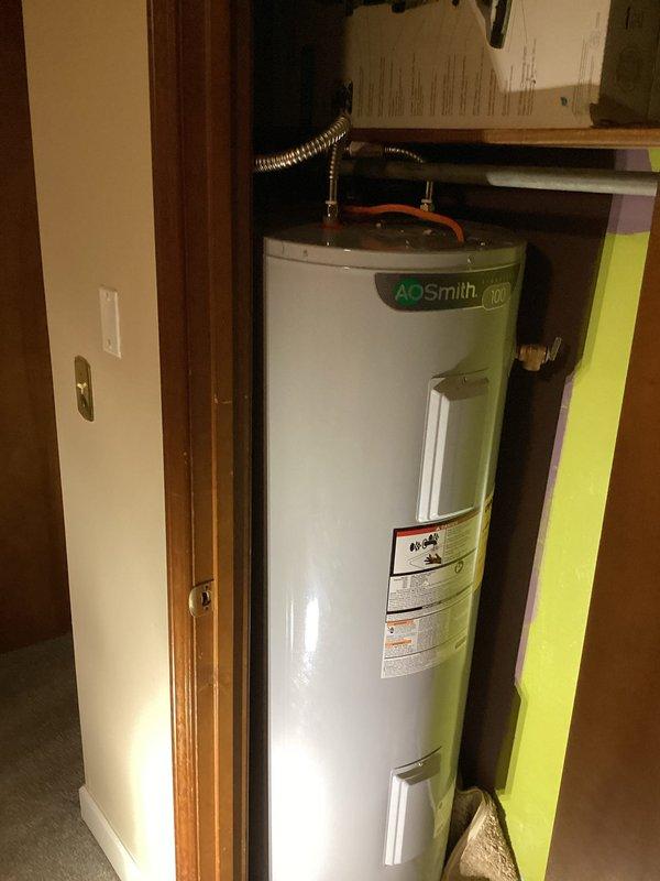Performed second opinion assessment on A.O. Smith water heater after previous service by another company failed to resolve overheating issue. Verified pressure readings (5-10 PSI) and determined thermostat adjustment was necessary to prevent scalding water temperatures. Adjusted thermostat to appropriate setting to resolve customer's complaint.