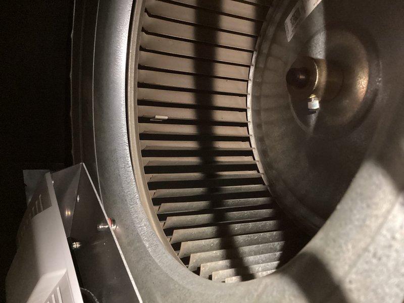 Performed annual maintenance on heating system, cleaning blower wheel assembly to remove dust buildup and ensure proper airflow. Tested Honeywell Home ProSeries thermostat operation, confirming proper heat mode function with temperature reading at 73°F and set point at 74°F. System functioning normally with fan operating as expected.