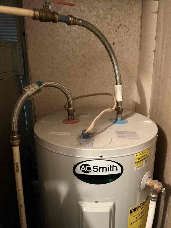 Conducted inspection of existing 10-year-old A.O. Smith water heater showing signs of age. Provided estimate for complete replacement, including all necessary plumbing connections and removal of old unit. Customer eligible for $500 installation discount promotion.