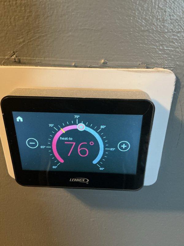 Performed annual heating system maintenance on Lennox system with digital thermostat set to 76°F heat mode. Noted expired 20x20x4 filter (not customer provided). Inspected A.O. Smith ProLine commercial water heater and all connected plumbing components, confirming proper operation of both heating and hot water systems.