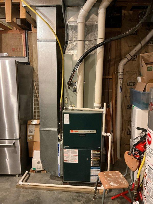 Conducted a comprehensive assessment of existing HVAC system for future replacement budgeting purposes, including evaluation of current furnace unit in basement utility area and outdoor AC condensing unit. Documented system components, installation configuration, and site conditions to prepare detailed replacement options for customer's budgetary planning.