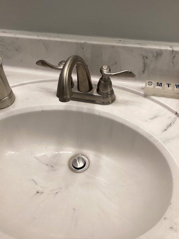 Conducted scheduled plumbing inspection as part of prepaid maintenance plan. Examined bathroom sink fixture and associated plumbing components, confirming proper function with no visible leaks or damage. Inspected accessible PVC drainage pipes and insulation in utility space, verifying adequate installation and structural integrity. Documentation photos taken of all inspected areas.