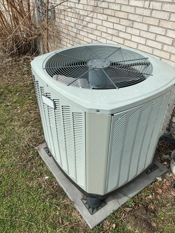 Performed basic monthly maintenance on central heating system. Inspected Honeywell thermostat which was functioning properly and set to 60°F heat mode. Examined outdoor condenser unit which showed no visible damage or issues; unit properly mounted on concrete pad with all connections intact.