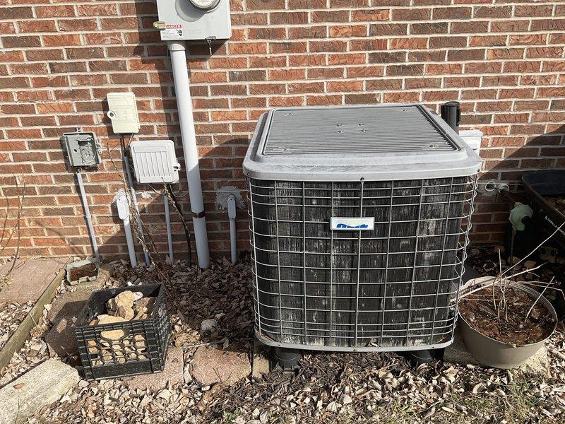 Conducted comprehensive system evaluation for full HVAC replacement. Inspected existing equipment including weathered exterior AC unit mounted against brick wall and Heil furnace in utility closet. Prepared detailed replacement estimate for complete system upgrade with customer requesting installation within one week timeframe.