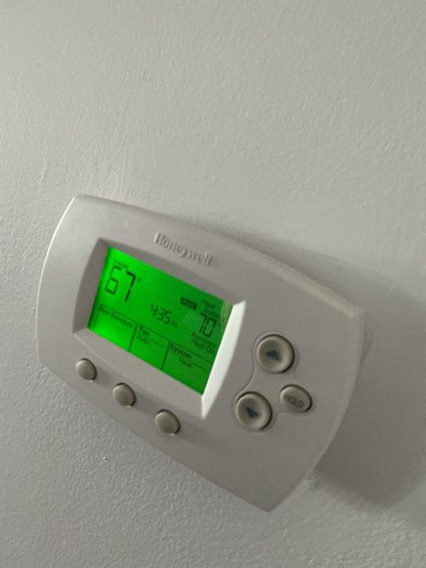 Performed monthly basic maintenance on CCHP cooling system, which included inspection of the Honeywell digital thermostat (confirmed proper operation at 67° with 70° setpoint) and examination of the outdoor condenser unit. System operating normally with no issues identified; customer advised that 20x20x4 filter was not included in service.