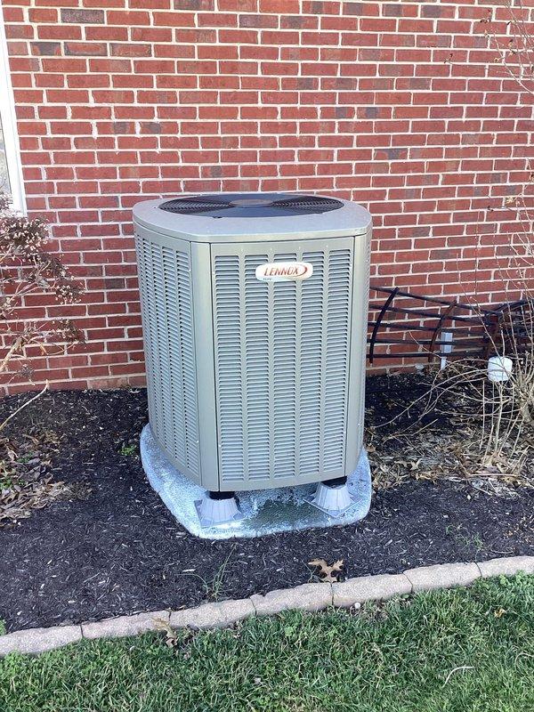 Diagnosed non-operational Lennox heat pump system with complete outside unit failure. Verified thermostat functionality showing proper temperature readings and heat mode operation. Customer declined troubleshooting fee.