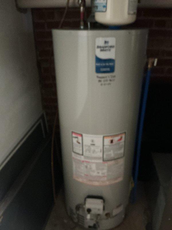Performed comprehensive heating tune-up on Bryant furnace system located in utility room. Inspected all components including control wiring, ductwork connections, and PVC condensate lines. Also noted water heater in good working condition with proper plumbing connections. All systems functioning normally with no issues detected.