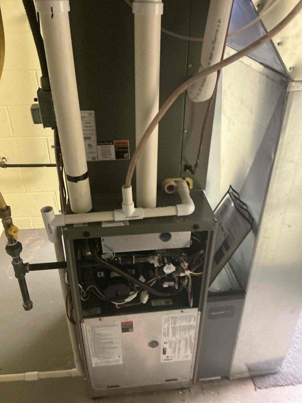 Performed monthly heating maintenance on vacant summer property (accessed through backdoor with provided code). Inspected gas furnace, checked all internal components and connections, and verified thermostat operation showing 64° current temperature with 60° setpoint. Left property secured with lights off as requested.