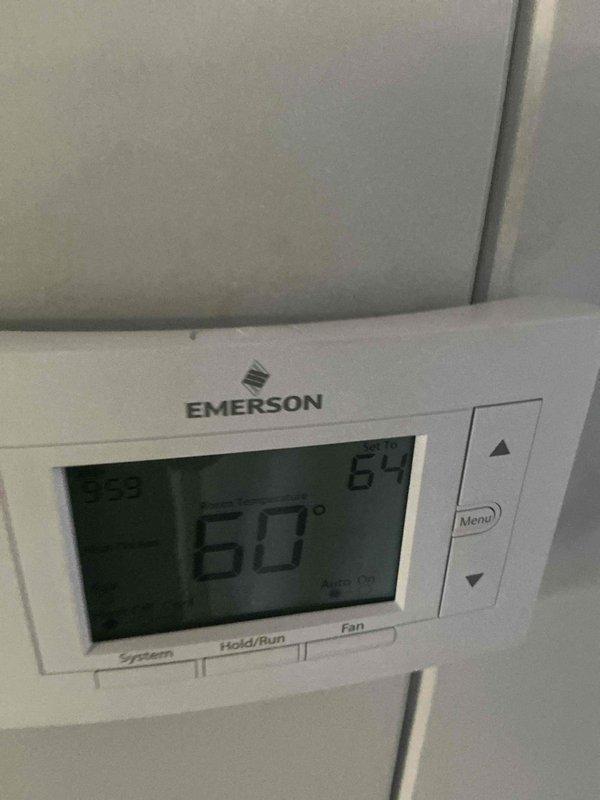Performed monthly heating maintenance on vacant summer property (accessed through backdoor with provided code). Inspected gas furnace, checked all internal components and connections, and verified thermostat operation showing 64° current temperature with 60° setpoint. Left property secured with lights off as requested.