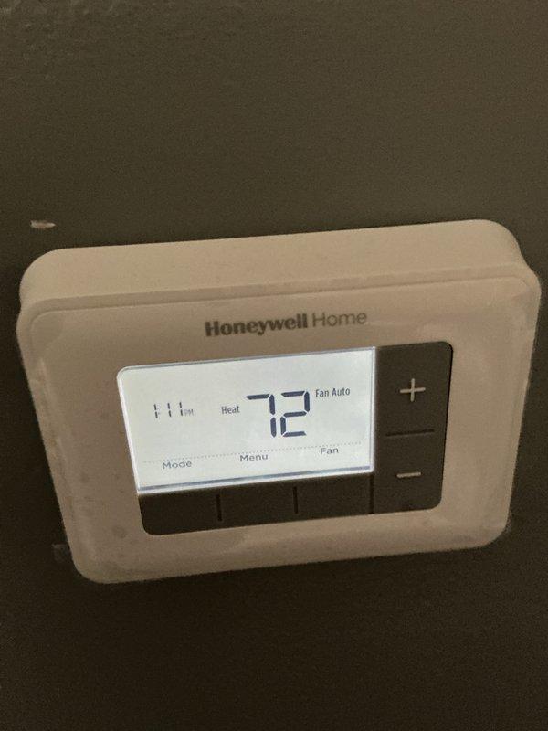 Completed monthly maintenance service on residential heating system, which included inspection of the furnace internals (motor, wiring, and electrical connections) and verification of thermostat functionality (confirmed proper operation at 72°F in Heat mode with Fan Auto setting). System appears to be functioning normally with no issues identified.