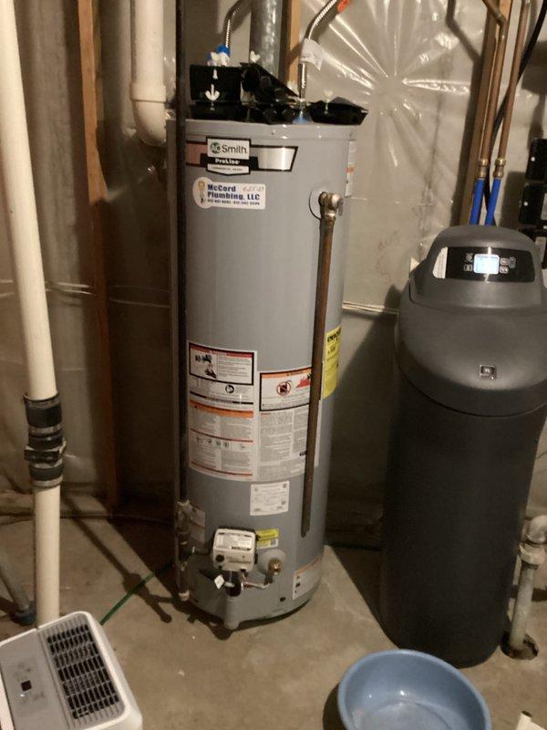 Performed basic monthly maintenance service on customer's heating system. Inspected Daikin thermostat which showed error history including gas furnace blower motor issues and thermostat communication errors. Noted A.O. Smith water heater and water softener system in utility room during inspection. Filter replacement (20x25x4) not included in service.