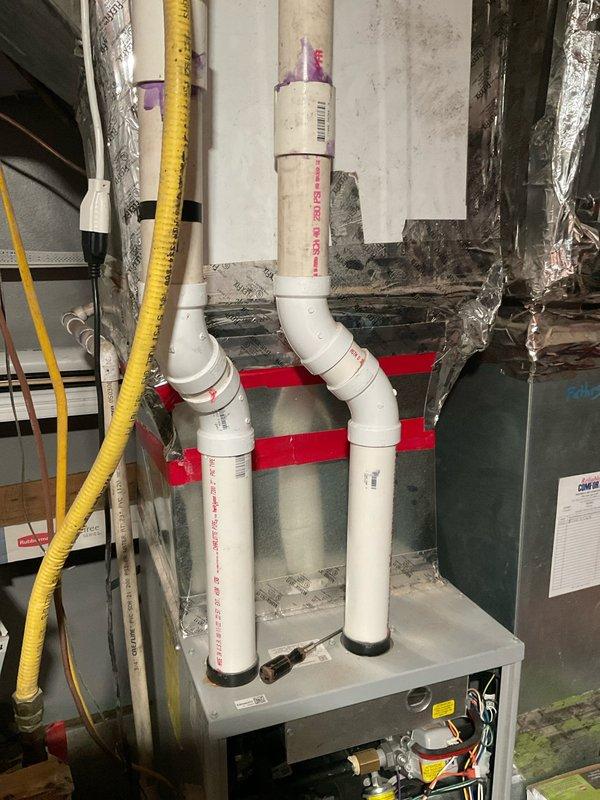 Diagnosed failed inducer motor in existing gas furnace system. Performed complete replacement of defective component, ensuring proper connection of exhaust/intake PVC piping and electrical connections. System now functioning correctly with all safety components verified operational.