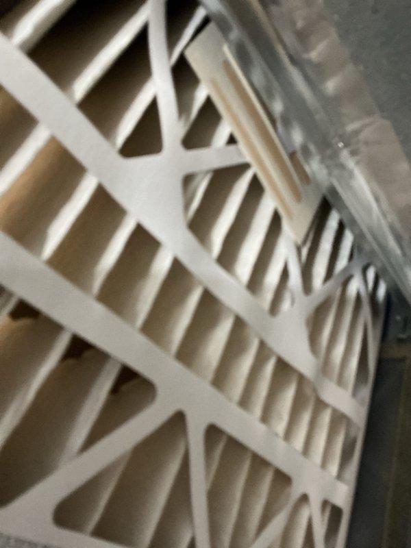 Performed maintenance on heating system under CCH Basic Plus agreement. Inspected A.O. Smith Signature water heater with copper and PVC connections. Examined existing air filter (20x25x4, not included in service) and documented condition with photos.