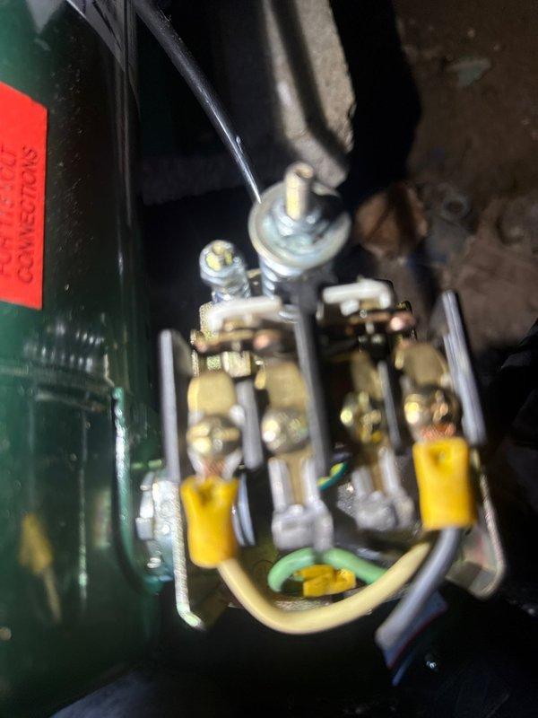 Conducted comprehensive plumbing inspection of basement water system, examining pump assembly with pressure gauge, expansion vessel, and PVC distribution piping. Inspected electrical connections at pump terminal assembly, verifying proper wiring of ground and power connections. All components were found to be functioning within normal parameters with no immediate service requirements.