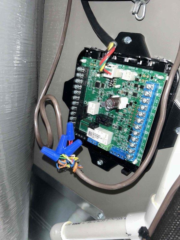 Performed warranty inspection on new installation and identified a defective external mitigation board that was faulty out of box. Documented the failed component with photos and determined replacement is required; will return to complete board swap.