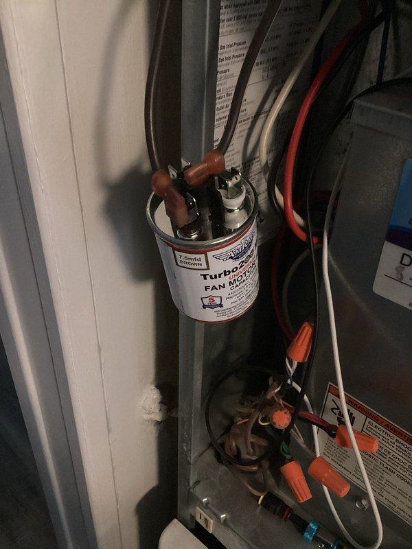 Responded to complimentary callback regarding high-pitched whine from furnace after customer's recent turbo capacitor replacement. Inspection of revoU system revealed improper installation of the replacement capacitor with incorrect wire connections. Properly reinstalled fan motor capacitor with secure terminal connections and verified system operation with no abnormal noise.