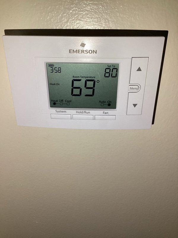 Responded to callback for furnace not heating and blowing cold air. Inspected system and found thermostat was functioning correctly, set to 80°F with "Heat On" status displayed. Examined furnace unit with proper venting and connections intact. Resolved issue and confirmed proper operation of heating system.