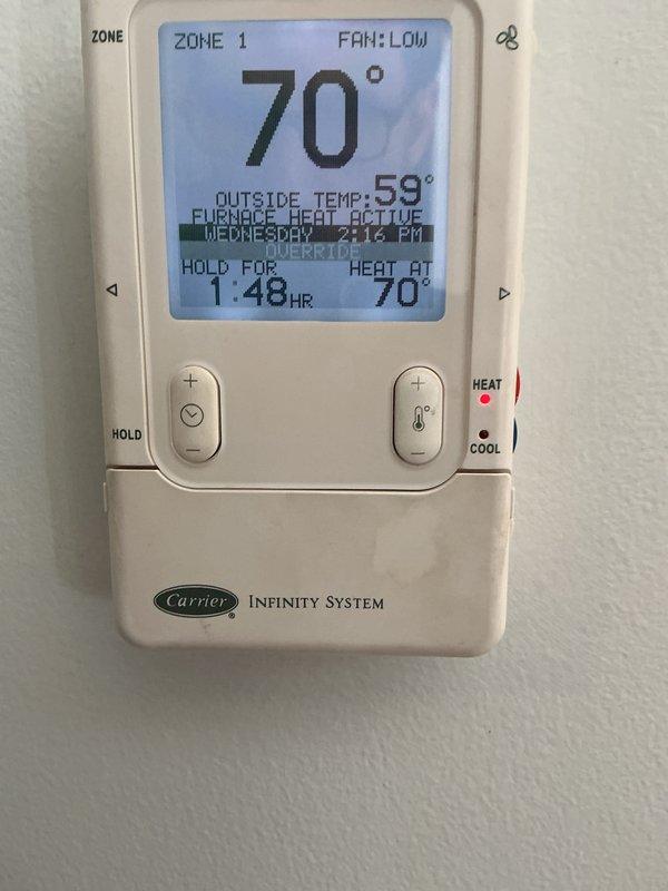 Completed basic monthly maintenance on Carrier Infinity System. Verified proper heating operation with furnace heat active and thermostat functioning correctly at 70° setpoint. System was operating normally with outdoor temperature at 59°.