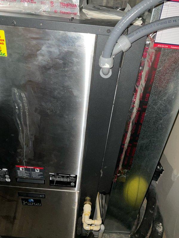 Performed maintenance inspection on dual HVAC systems and discovered one system was locked out due to low refrigerant levels. Documented existing equipment including the furnace unit with PVC condensate drainage and the 16-inch round damper (DAMPRND16INC-B). Customer has requested a full system replacement estimate and has opted into SMS communications.
