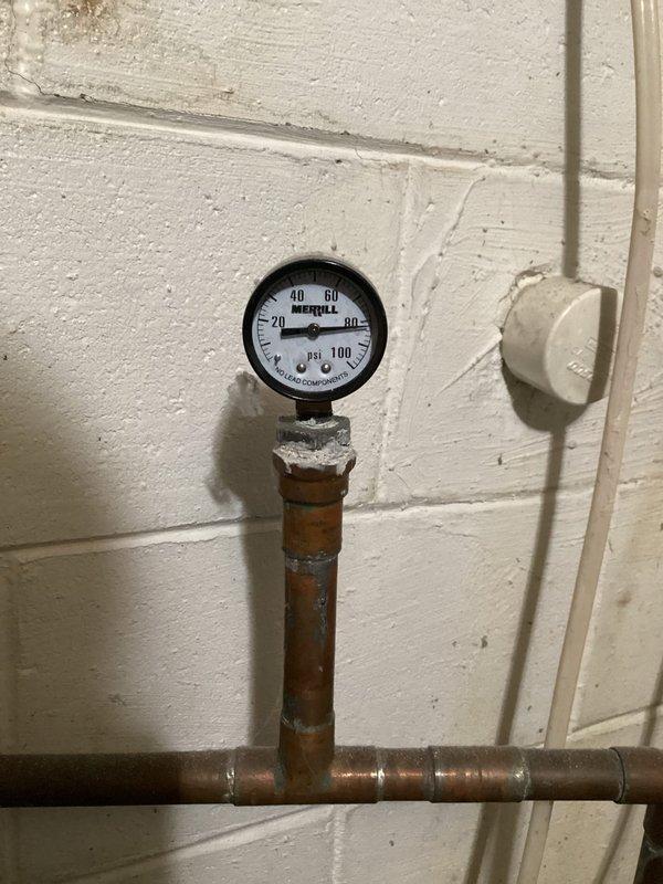 Completed monthly plumbing inspection of residential water heater system (AO Smith ProLine model) and associated plumbing components. Verified proper ventilation through galvanized metal vent pipe, checked all copper supply lines for leaks, and confirmed pressure gauge reading of approximately 20 psi, which is within normal operating parameters.