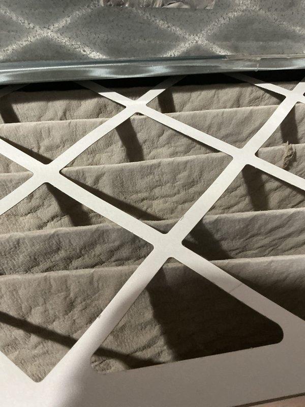 Performed monthly maintenance service on heating system as part of CCH Basic Plus plan. Inspected air filtration system with 20x20x4 filter (not included in service) and noted filter showing normal wear with slight discoloration. Examined water heater installation including expansion tank, circulation pump, and associated plumbing connections - all components functioning properly with no leaks detected.