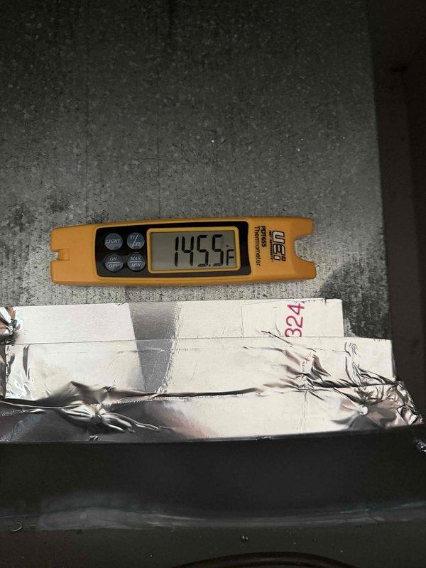 Completed installation of a Lennox heat pump system with new electric water heater. Temperature testing confirmed proper operation with supply air reaching 145.5°F. Outdoor unit was properly mounted on concrete pad with appropriate electrical disconnect and line set connections installed according to manufacturer specifications.