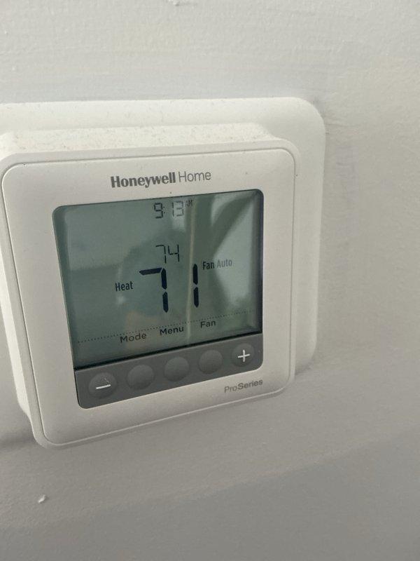 Completed monthly maintenance service that was rescheduled from 01/27. Inspected Honeywell Home ProSeries thermostat which was functioning properly in heat mode with a 73°F setpoint. Checked residential water heater with all connections and safety systems in good working order.