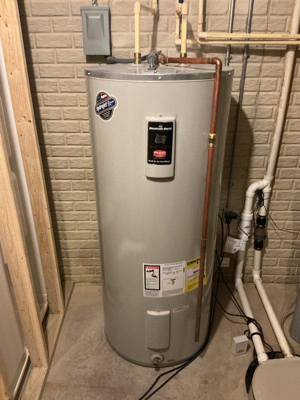 Completed monthly maintenance service that was rescheduled from 01/27. Inspected Honeywell Home ProSeries thermostat which was functioning properly in heat mode with a 73°F setpoint. Checked residential water heater with all connections and safety systems in good working order.
