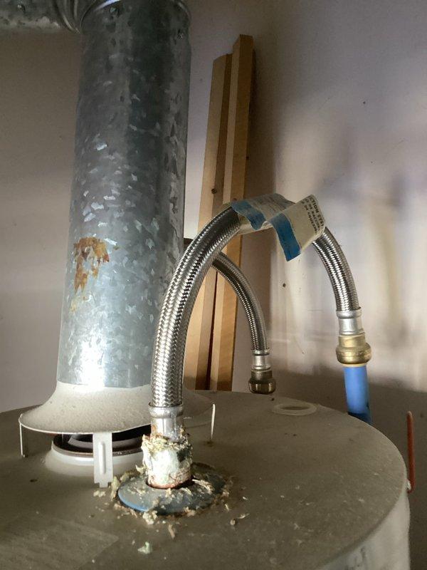 Arrived at customer's residence before 5PM as requested to address water heater pilot light failure. Upon inspection, identified corrosion at tank connection points and oxidation on the galvanized vent pipe. Successfully cleaned thermocouple, relit pilot light, and tested water heater for proper operation before customer's scheduled departure.