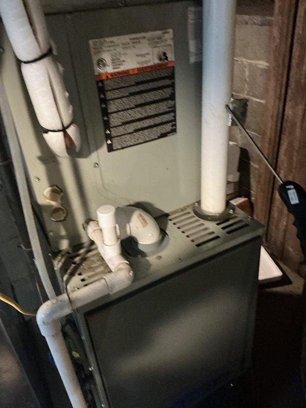 Performed Basic Monthly CCH maintenance on residential furnace system. Inspected and documented proper operation of the unit, including ventilation piping and condensate drain. Replaced 16x20x1 filter as included in service package and verified thermostat functionality, which was maintaining temperature at 70°F with setpoint of 76°F.