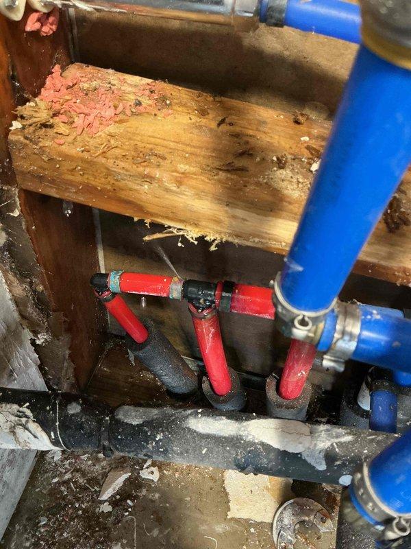 Responded to a recurring water softener leak issue that had persisted despite two previous repair attempts. Upon inspection, identified damaged water supply connections and deteriorated wooden framing showing significant moisture damage. Replaced faulty PVC fittings and shut-off valves, ensuring proper sealing of all connections to eliminate the leak source.