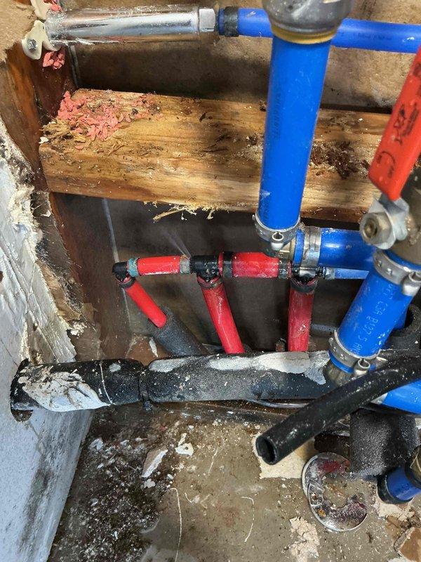 Responded to a recurring water softener leak issue that had persisted despite two previous repair attempts. Upon inspection, identified damaged water supply connections and deteriorated wooden framing showing significant moisture damage. Replaced faulty PVC fittings and shut-off valves, ensuring proper sealing of all connections to eliminate the leak source.