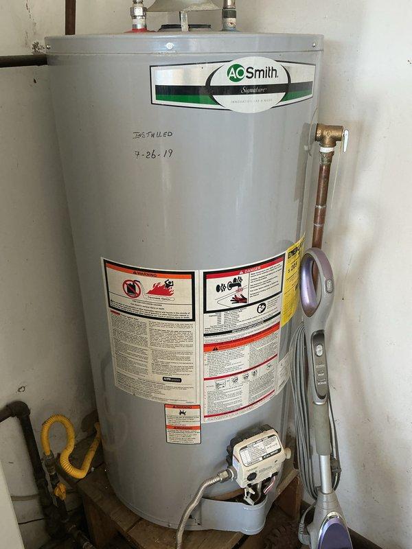 Performed monthly basic maintenance service on A.O. Smith water heater (installed 9/26/19). Cleaned and inspected washable filter. System is operating normally with no visible damage, leaks, or rust observed on unit or connecting plumbing.