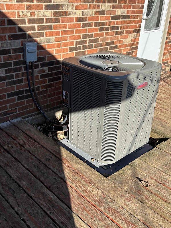 Successfully installed a complete Lennox heat pump system with matching air handler. The outdoor unit was properly positioned on a wooden deck with secure electrical connections to the disconnect box mounted on the exterior wall. System was tested and verified to be functioning according to manufacturer specifications.